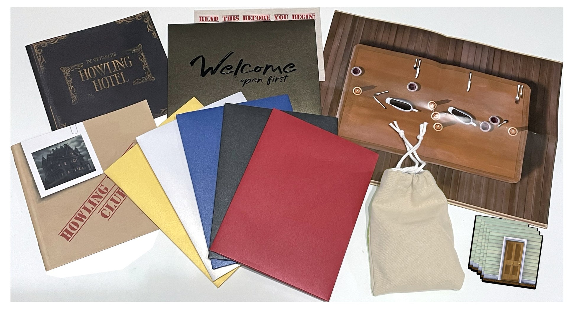 Madame Medora's Howling Hotel escape room game components including story booklet, envelopes, clue book and door cards