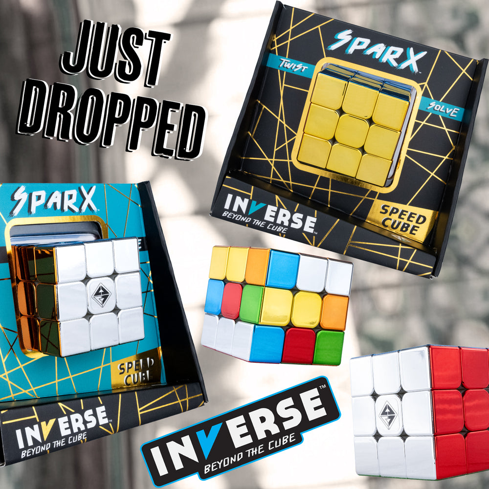 Sparx and Inverse speed cubes with packaging on a blurred background
